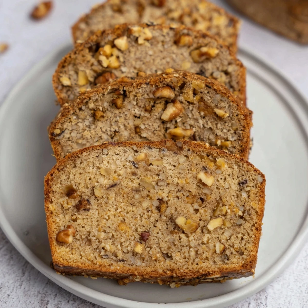A golden-brown nutty whole wheat loaf bread, perfect for sandwiches or toasted with butter.