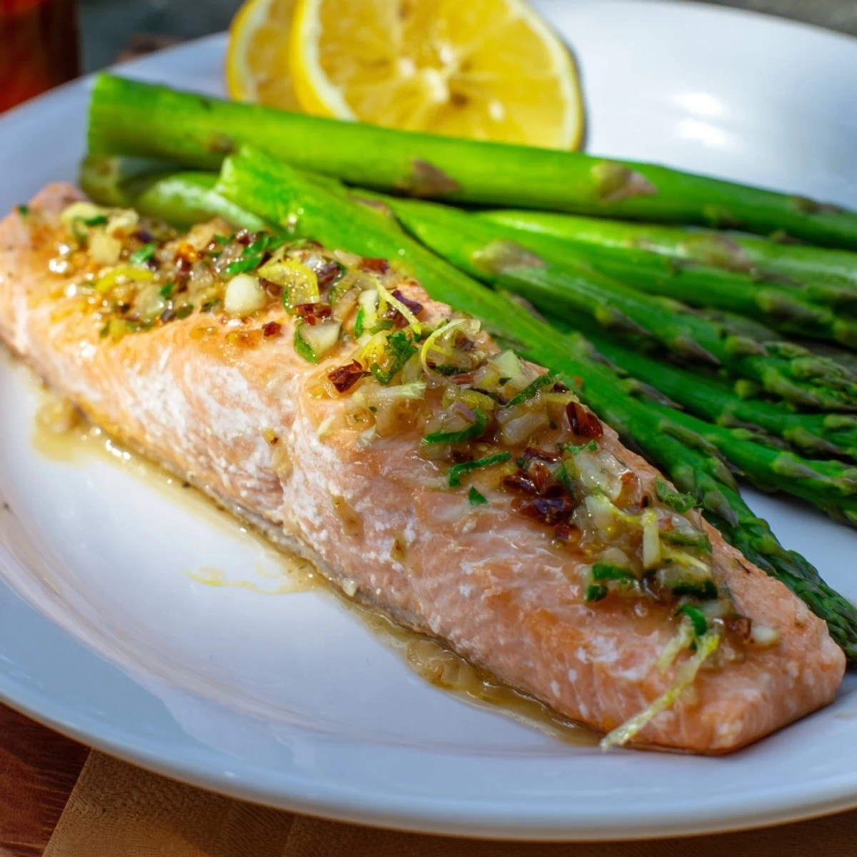 Golden skillet lemon-butter salmon with tender asparagus, a flavorful weeknight meal.