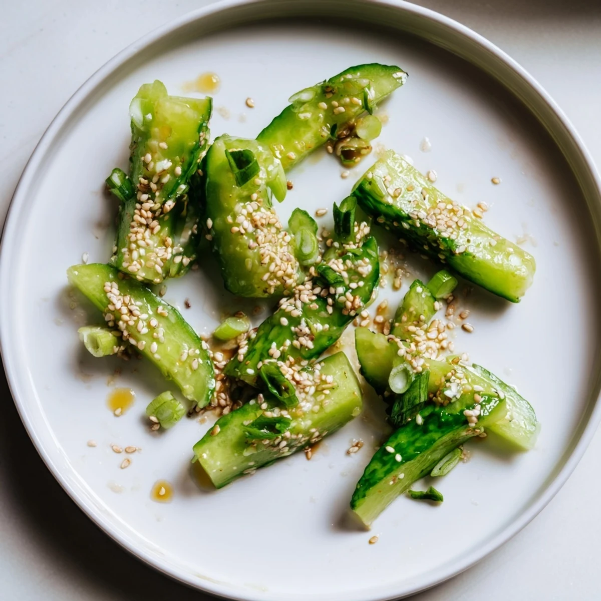 Flavorful Cucumber Shaker with rice vinegar, a refreshing vegan side dish with appealing textures.