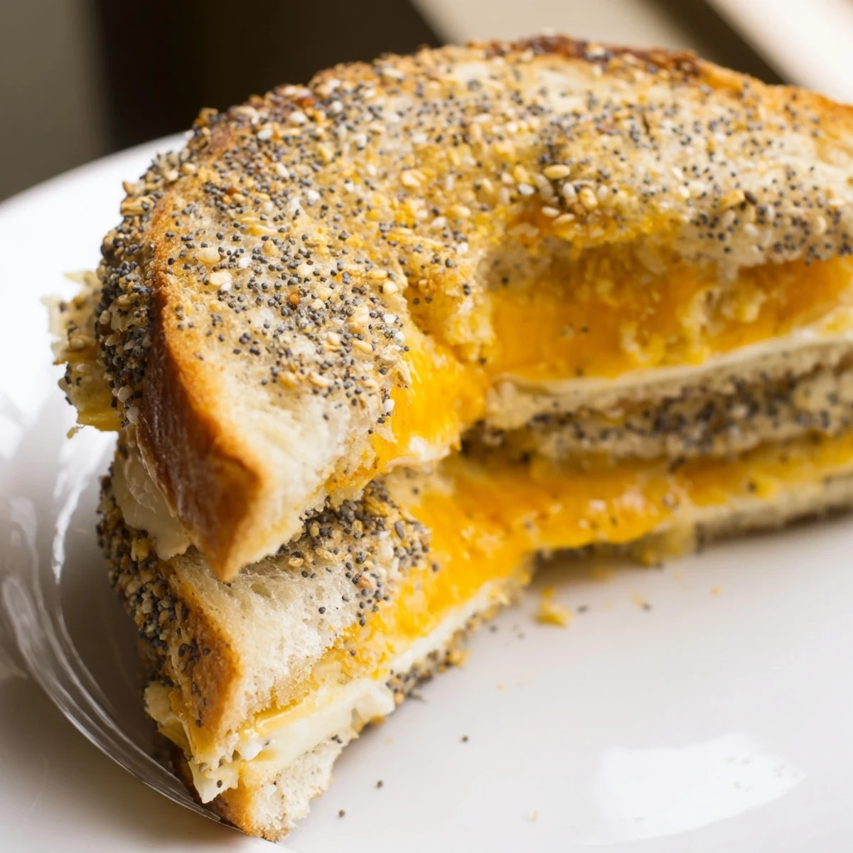 Crispy, golden-brown Everything Bagel Grilled Cheese with melted cheese, perfect for a quick, comforting lunch.
