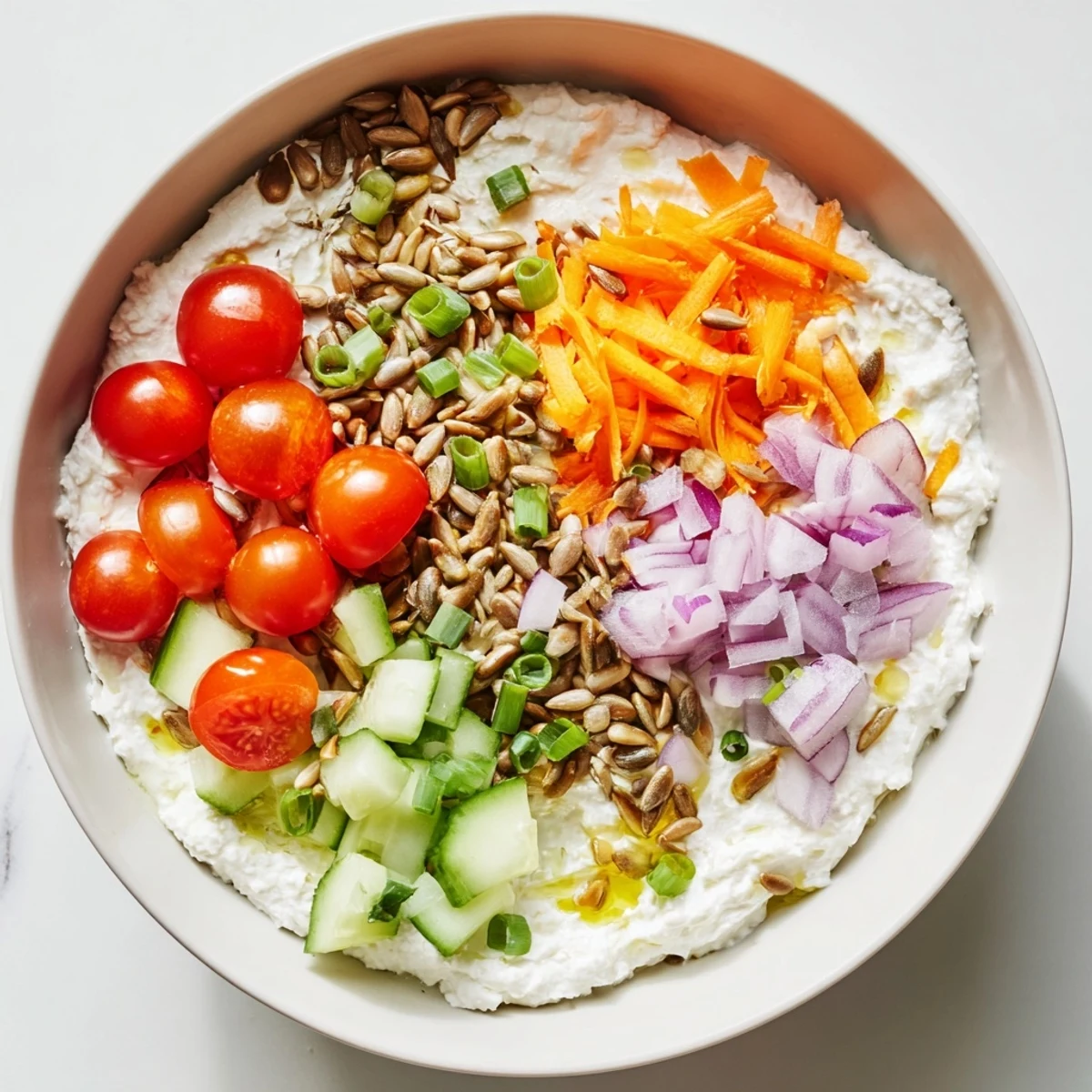 A delicious, high-protein Cottage Cheese Snack Bowl, featuring creamy cottage cheese and colorful toppings.
