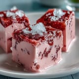 Elegant strawberry rose gelatin mosaic cake, a refreshing chilled dessert.