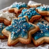 Bright, buttery Gemini Zodiac Cookies adorned with glittering star icing, perfect for parties.
