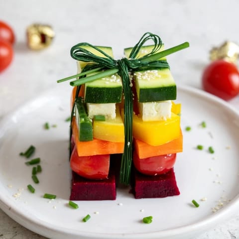 Freshly assembled Stacked Gift Box Veggie Cubes with colorful veggies and creamy feta cheese.