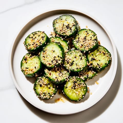 Cool cucumber, coated in savory everything bagel seasoning—a crunchy, flavorful delight for sharing.