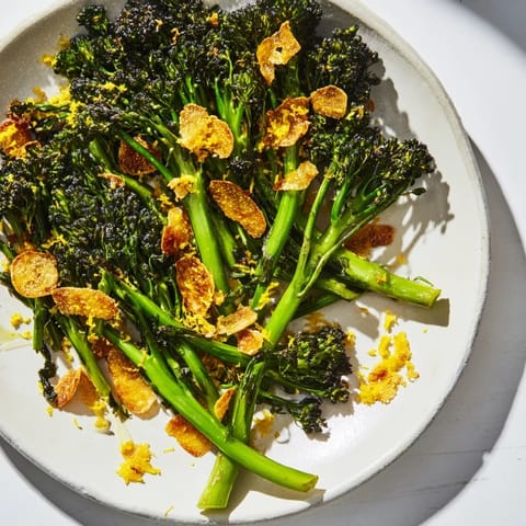 This vibrant charred broccolini salad features perfectly cooked broccolini, showered with Parmesan and zest.