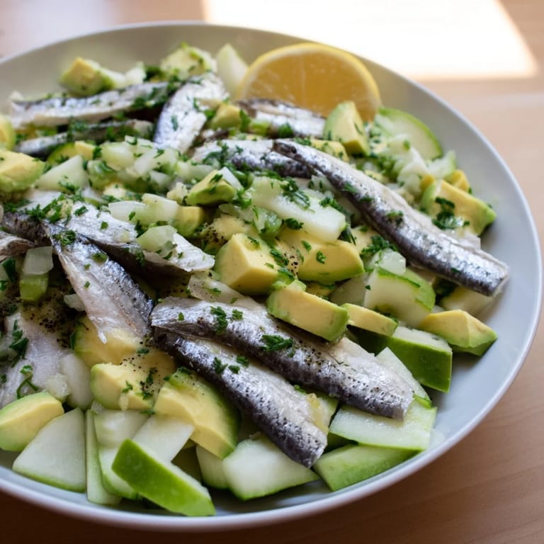Bright green layers of cucumber and fresh herbs in this tasty Cucumber and Tinned Fish Date Night Salad.
